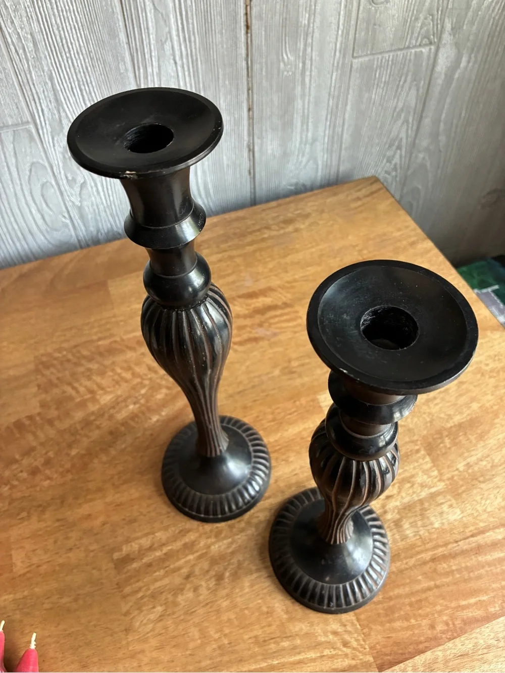 Vintage like Black Metal Candlesticks with Red Ribbed Taper Candles. Very heavy